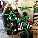 5-geschenkverpackung-geschenkbox-verpackungin-weiß-und-schwarz-mit-grünen-schleifen